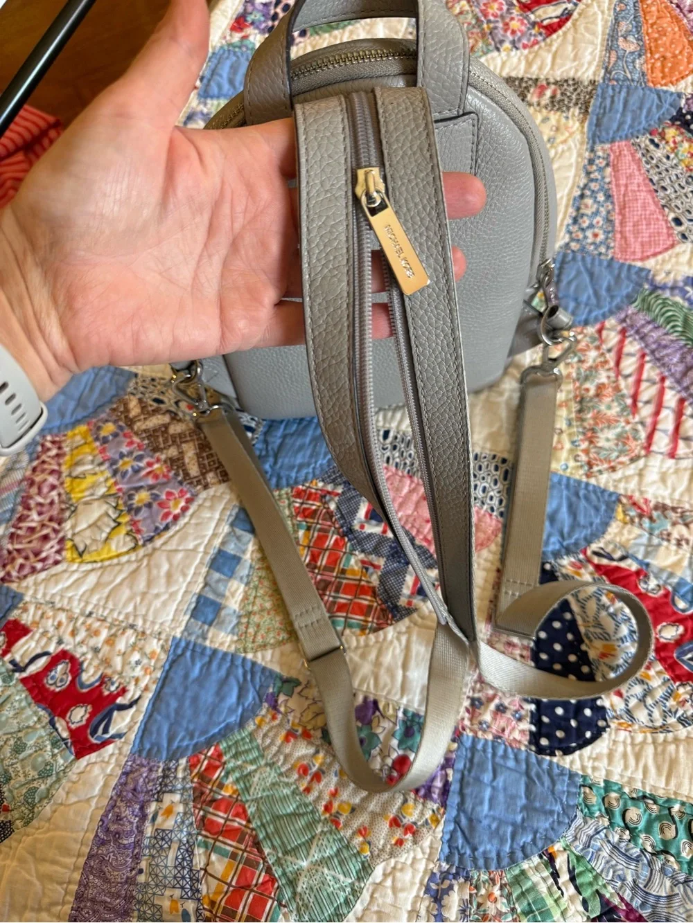 Michael Kors Pebbled Leather Mini Backpack in Light Gray with Gold Hardware